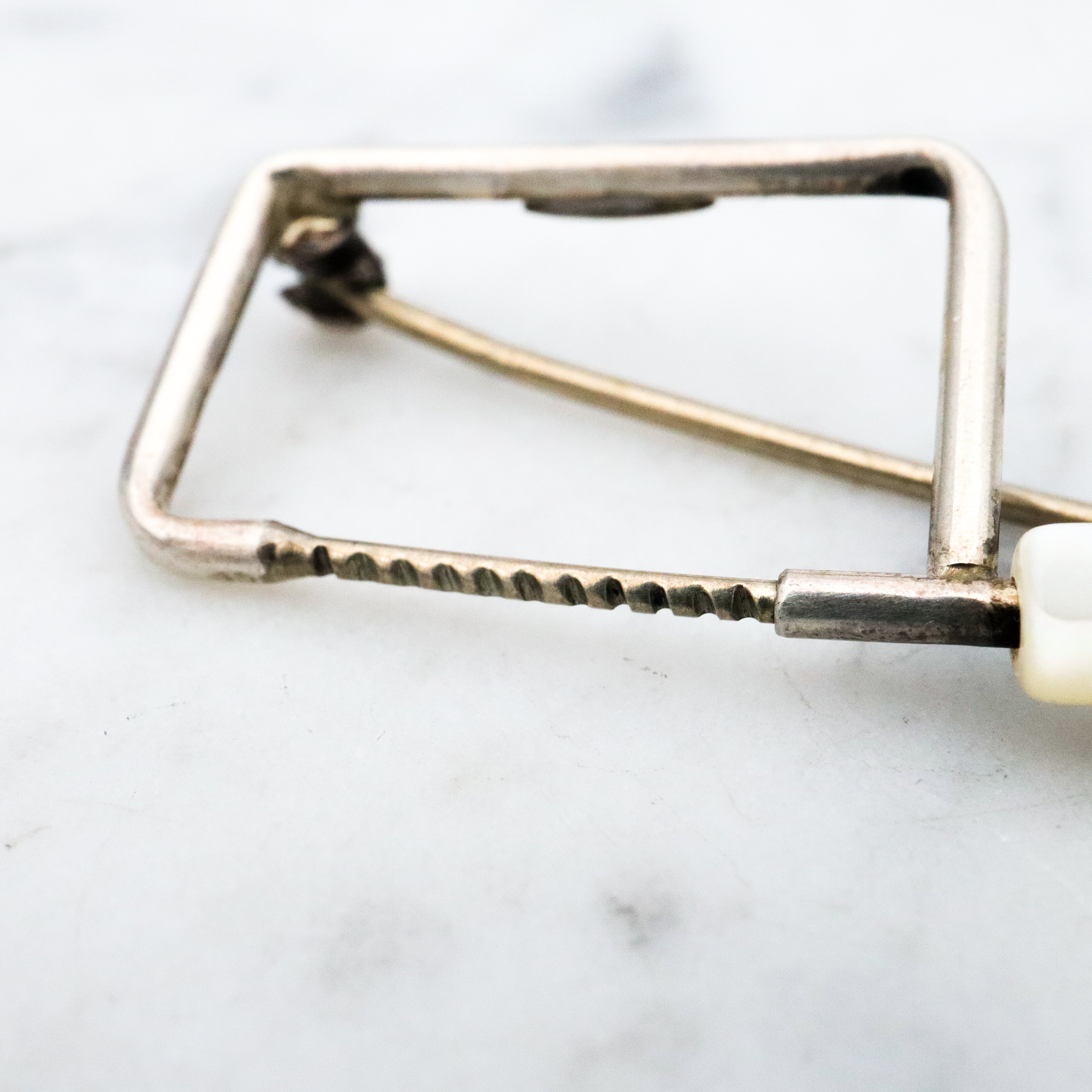 Unique one of a kind sterling & mother of pearl coping saw brooch